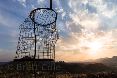 Wire cage that likley once protected a mango tree or something similar, above the Nareli Jain temple, Ajmer, Rajasthan, India