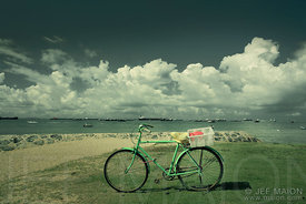 Old bicycle by sea