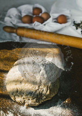 Woman Preparing Homemade Dough in the Kitchen with Mincing Machine. Preparation Raw Dough for Baking