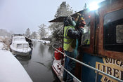 A welder working on a barge on the Grand Canal, Hazelhatch, Celbridge, Co. Kldare during the snow on Wednesday..06.01.10.Pic. Maura Hickey/086 8541130.