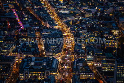 Night aerial view of Christmas lights on Oxford Circus and Regent St, London.