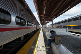 Woman Reading, Caltrain Station, San Francisco, CA, USA.