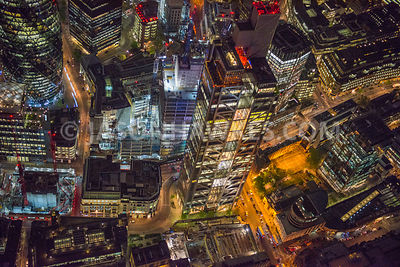 Night aerial view of The Heron Tower / Salesforce tower with it's famous rooftop restaurants and bars.