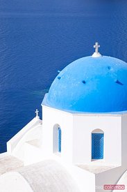 Blue domed orthodox church in Oia, Santorini, Greece