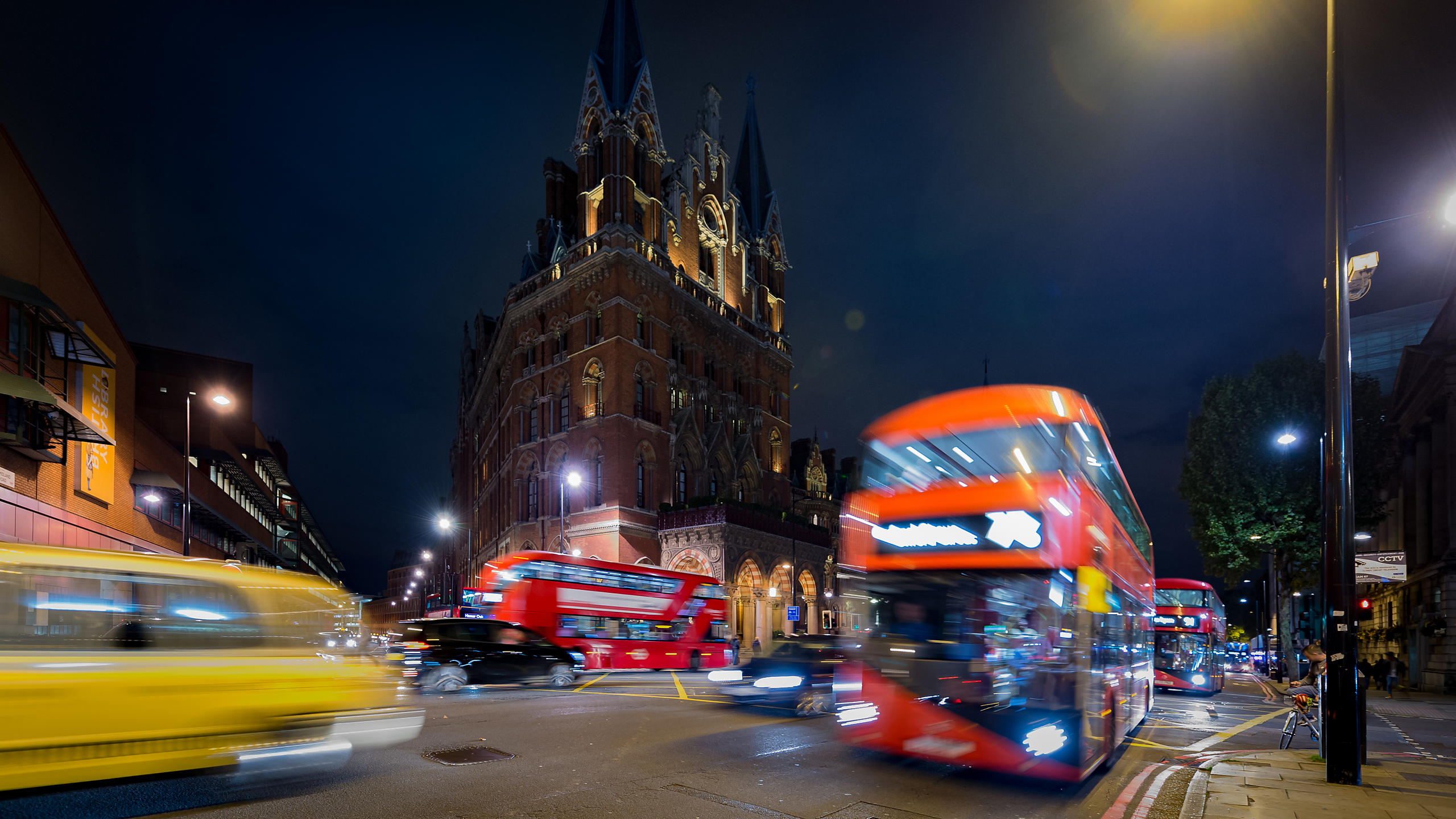Busy London Traffic at Night with St Pancras Station Hotel