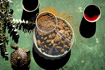 Cacao Ashwagandha Almonds served with hibiscus tea.