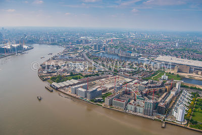 Aerial view over Silvertown, London. Britannia Village (West Silvertown) (London), Excel centre, london, Lyle Park, Peruvian Wharf, Pontoon Dock, Royal Victoria Dock, Royal Wharf, Silvertown, Thames Barrier Park, The Royal Docks