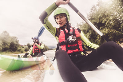 Germany, Bavaria, Allgaeu, couple kayaking on river Iller