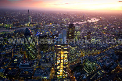 Aerial view over City of London at sunset