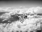 Vulcan above majestic clouds BW version