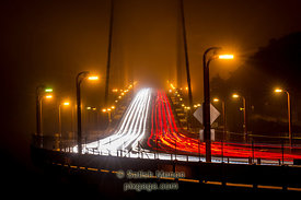 Night traffic on Golden Gate Bridge, San Francisco, CA, USA