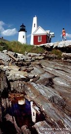 Maine lighthouse and reflection