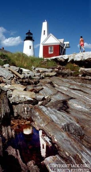 Maine lighthouse and reflection