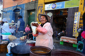 Woman preparing buñuelos, La Paz , Bolivia