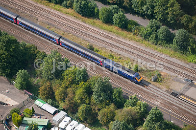 Aerial view of train on railway / tracks