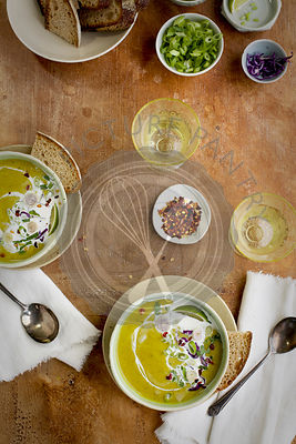 Red Lentil Cilantro Coconut Soup served with bread.