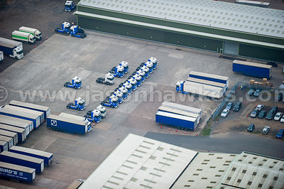 Aerial view of lorries at warehouse