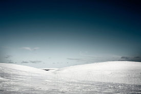 Wide snow landscape with hills