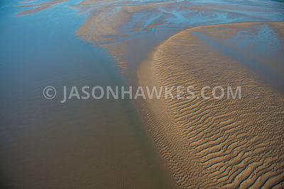 Aerial view of patterns in the sand on a beach in North Wales