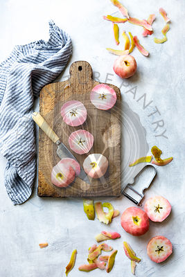 Chopped pink apples on a chopping board