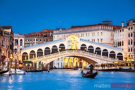 Rialto bridge and gondola, Venice, Italy