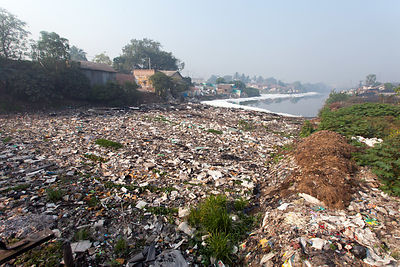 Trash fills a creek near Dhapa, Kolkata, India. Dhapa is the site of Kolkata's largest landfill, and numerous recycling and incineration operations.