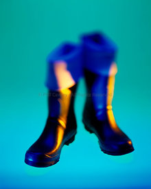 wellington boots on colorful background
