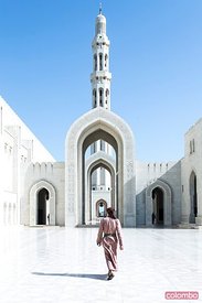 Sultan Qaboos grand mosque with local man, Muscat, Oman