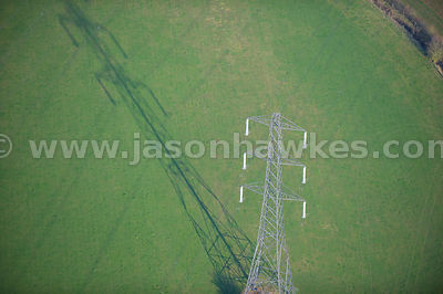 Aerial view of electricity pylons in fields, Worcestershire