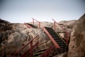 Wooden stairs on rock