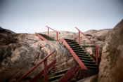 Wooden stairs on rock