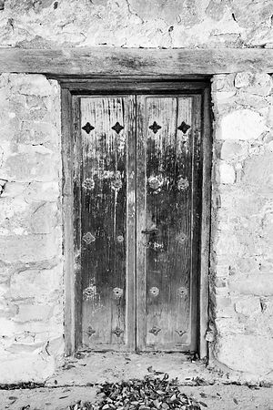 OLD DOOR MISSION SAN JUAN CAPISTRANO SAN ANTONIO TEXAS BLACK AND WHITE