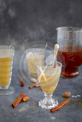 Almond Lime Italian Soda in glassware. Photographed on dark gray background.
