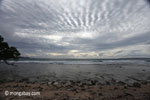 Sunset on the ocean-side coastline of Peucang Island [java_0066]