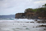 Waves breaking on the ocean-side coastline of Peucang Island [java_0073]