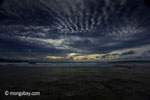 Sunset on the ocean-side coastline of Peucang Island [java_0078]