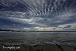 Sunset on the ocean-side coastline of Peucang Island [java_0079]