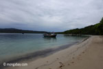 Boat near a beach on Peucang Island [java_0165]