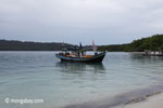 Boat near a beach on Peucang Island [java_0167]