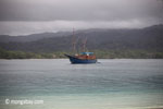 Boat off Peucang Island [java_0685]