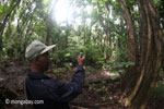 Ranger using a camera phone on patrol