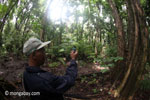 Ranger using a camera phone on patrol [java_0738]