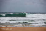 Indian Ocean surf breaking on the Western-most part of Java [java_0801]