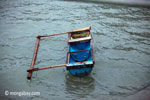 Boat made out of a plastic drum