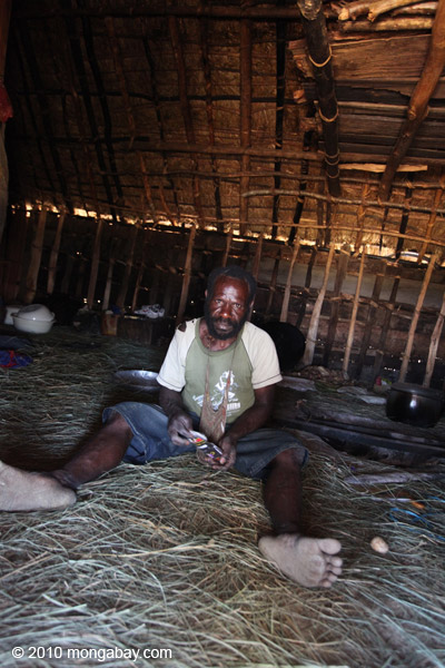 Lani man in his hut