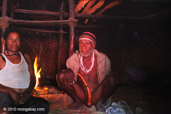 Group of Lani people in a hut