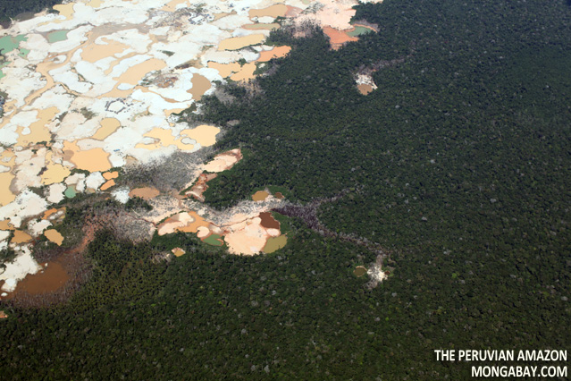 Mining operations at the Rio Huaypetue gold mine in Peru