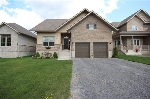 Main Photo: 822 Kananaskis Drive in Kingston: House (Bungalow) for sale : MLS(r) # 12600497