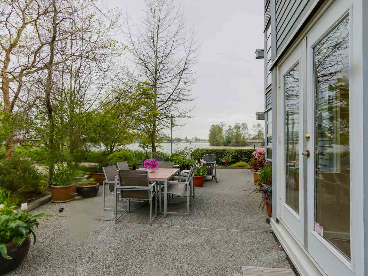Main Photo: 108 1880 E KENT AVENUE SOUTH in Vancouver: Fraserview VE Condo for sale in "PILOT HOUSE AT TUGBOAT LANDING" (Vancouver East) : MLS®# R2057021