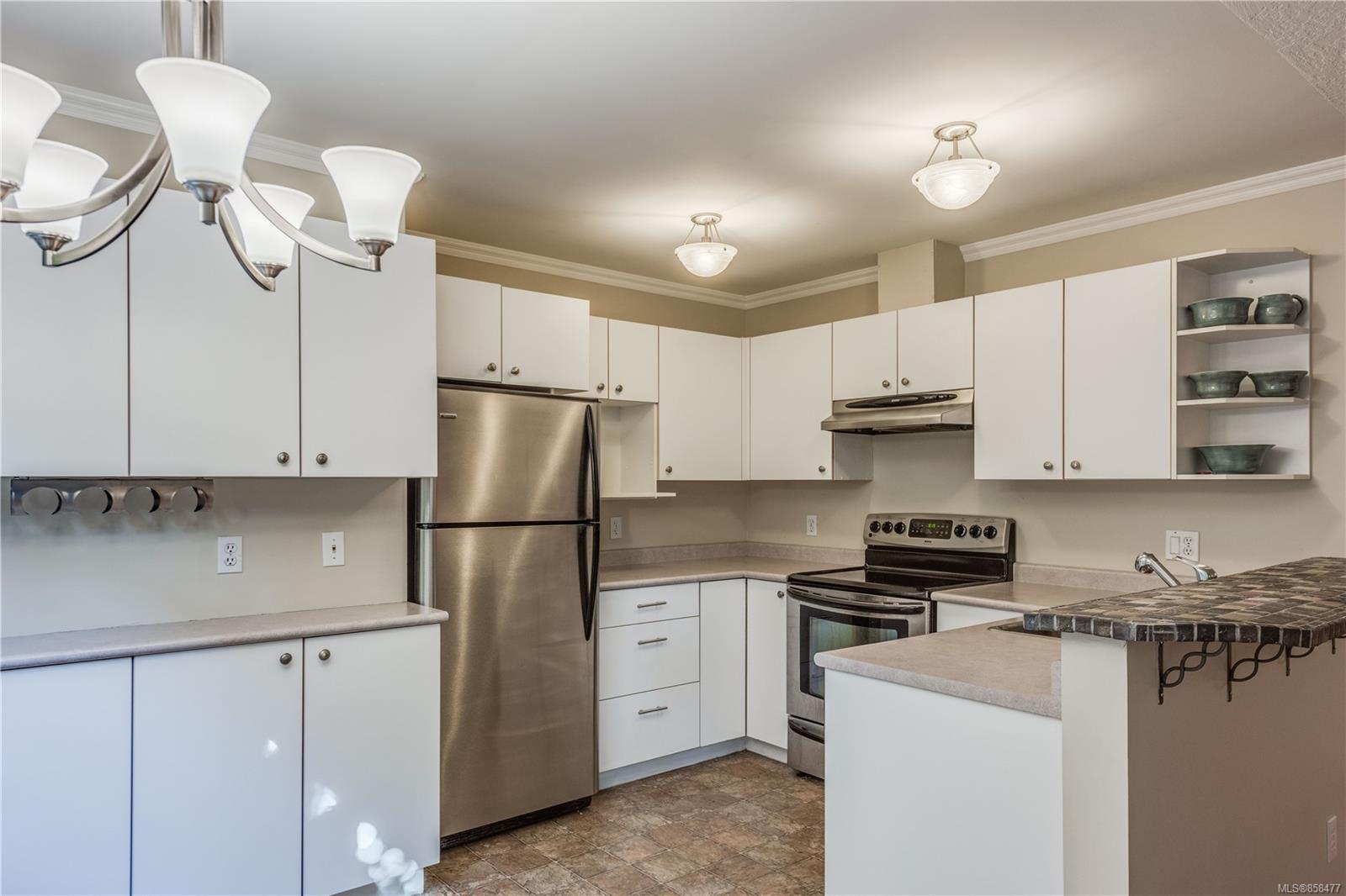 FEATURED LISTING: 102 - 1025 Meares St